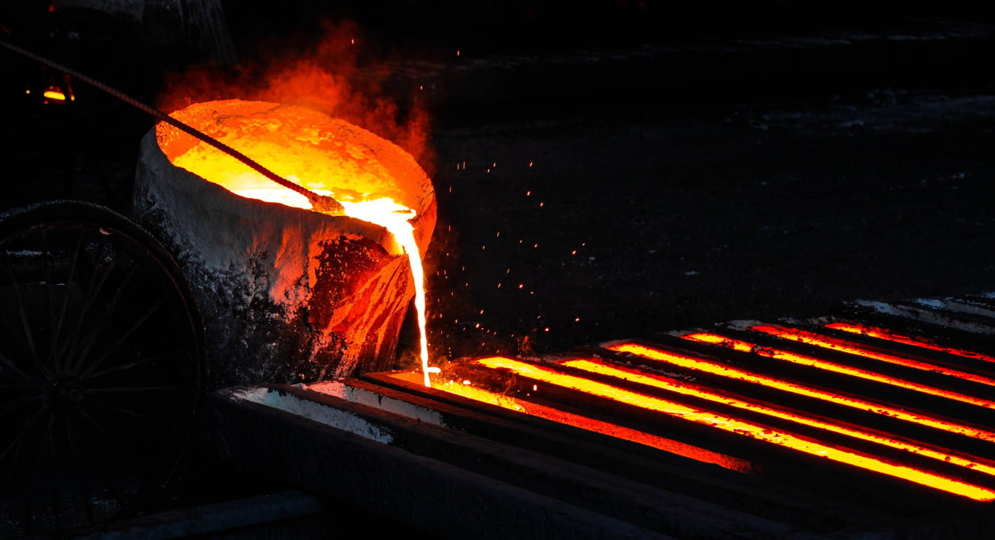 Molten steel being poured into moulds