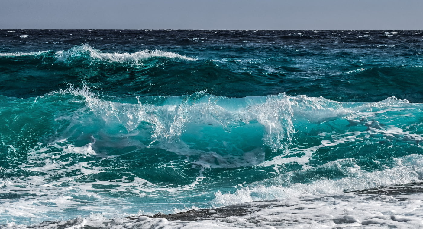 Ocean waves breaking and spray